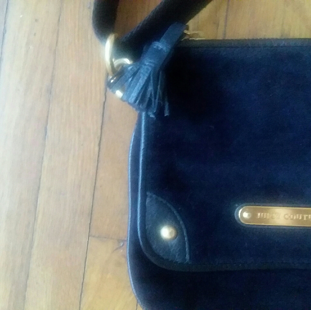 Juicy Couture Black satchel!!!!!!! Poka-Dot Interior soft material
ITEM #1 - Picture 9 of 16